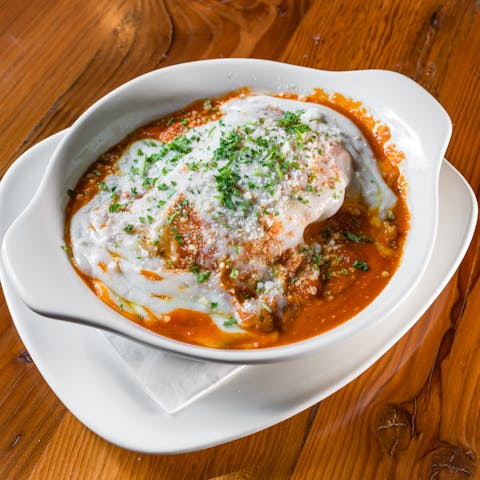 Nonna Rosa's Ristorante Italiano signature dishes Lasagna, Chicken Parmesan, Manicotti.